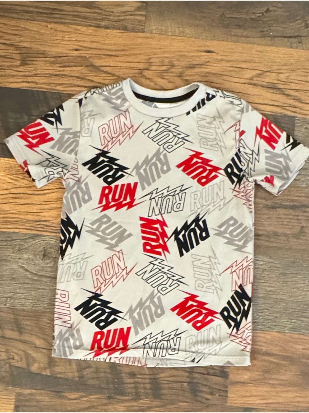 Reebok White Tee with Red, Black & Gray 'RUN' Allover Print